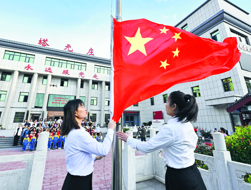 我市各地举行升国旗仪式
